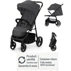 Poussette canne Kinderkraft TRIG 3 grise, montrant sa légèreté et la suspension sur les 4 roues.